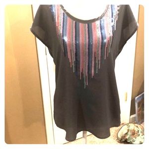 Light gray top with design